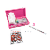 The Brouk & Co Mini Travel Mahjong Set, in pink, includes beginner-friendly tiles, dice, a W tile, and a How to Play Mah-Jongg booklet—perfect for new players or anyone wanting a portable mahjong set.