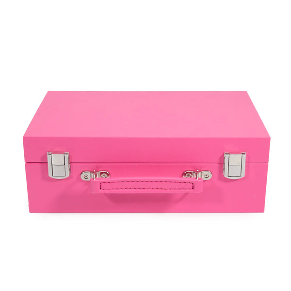 The Mini Travel Rumi Set by Brouk & Co is a closed, bright pink rectangular case with a silver handle and two silver latches, perfect for portable play.