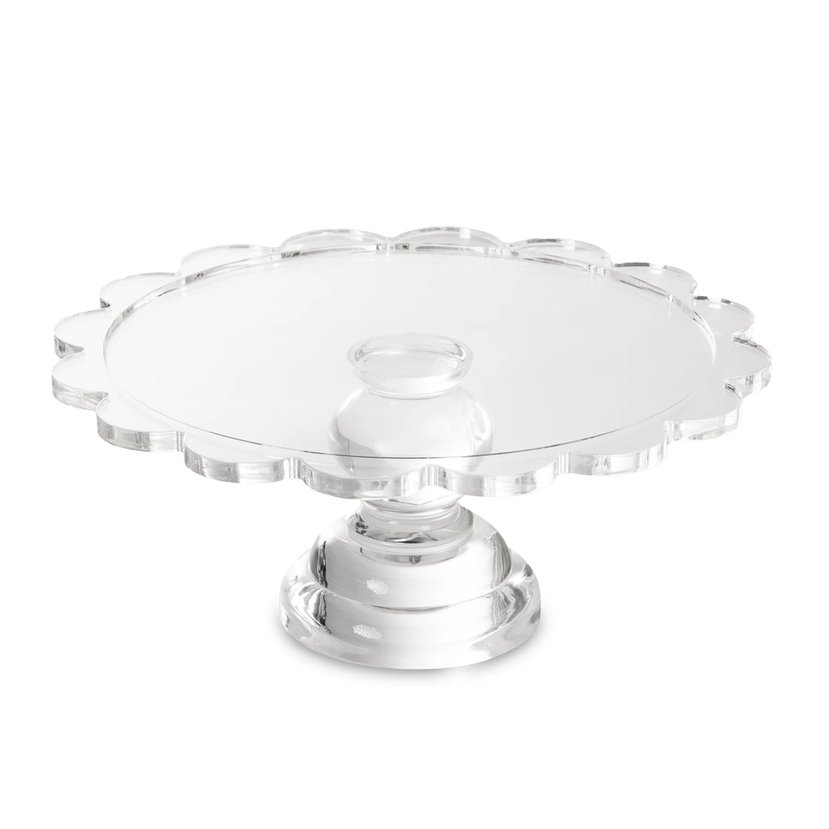 The Coco Scalloped Cake Server by Inspired Generations features clear glass with scalloped edges and a sturdy, round pedestal base. Photographed on a white background, this elegant pedestal server is perfect for showcasing your favorite desserts.