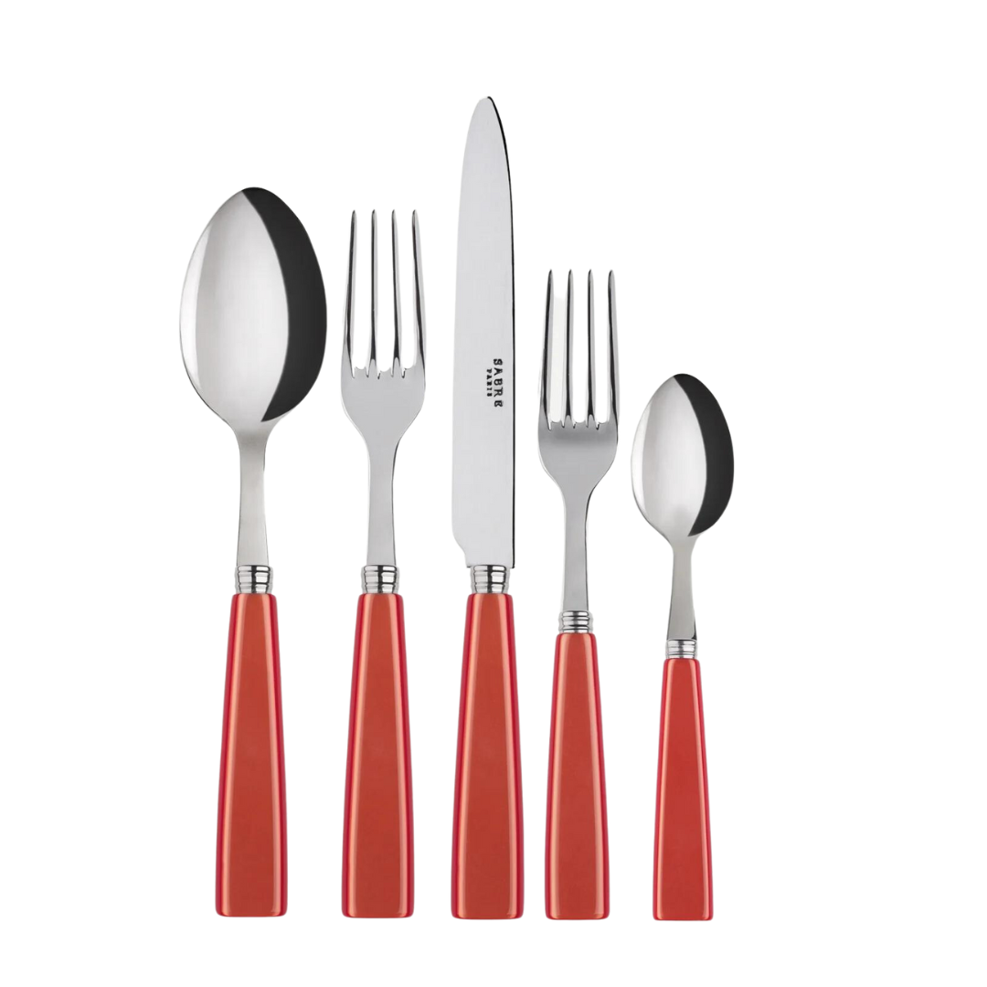 The Sabre Icone Flatware 5 Piece Setting features 18/10 stainless steel utensils with glossy red handles—large spoon, large fork, knife, small fork, and small spoon—displayed side by side on a white background.