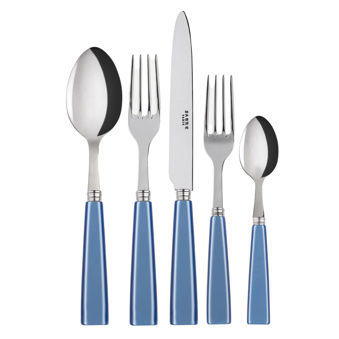 The Sabre Icone Flatware 5 Piece Setting includes a tablespoon, dinner fork, knife, salad fork, and teaspoon with blue handles and 18/10 stainless steel tops, arranged side by side on a white background.