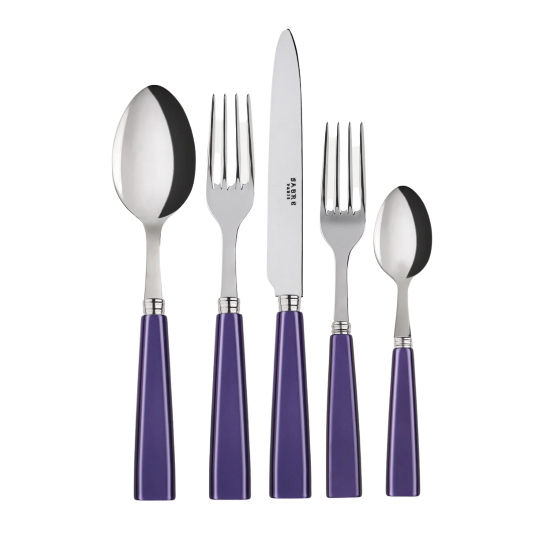 The Sabre Icone Flatware 5 Piece Setting includes a tablespoon, dinner fork, knife, salad fork, and teaspoon, each with a shiny 18/10 stainless steel head and purple handle for a stylish look.