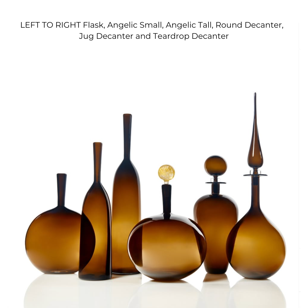The Petite Decanter Straight Cone by Cariati is a handblown amber glass decanter, ideal for elevating your modern barware collection with its unique shape and elegant design.