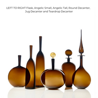 The Petite Decanter Straight Cone by Cariati is a handblown amber glass decanter, ideal for elevating your modern barware collection with its unique shape and elegant design.