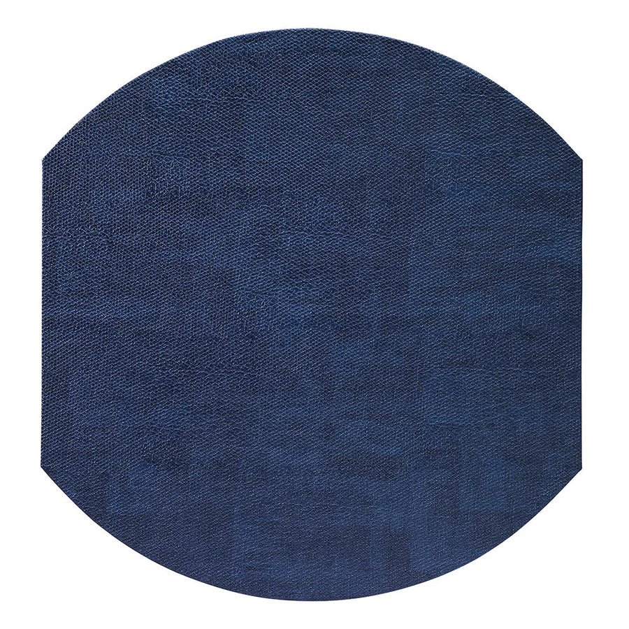 The Bodrum New Luster Elliptic Placemat Set of 4 features dark blue, textured fabric mats with gently flattened sides, displayed on a white background.