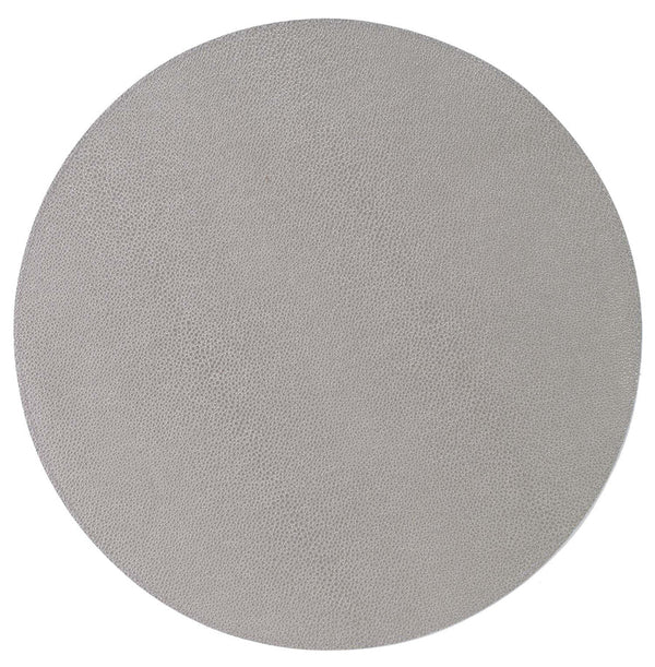 The Bodrum Skate Round Placemat Grey Set of 4 features round, light gray, leather-like textured surfaces made of phthalate-free vinyl, shown from above against a white background.