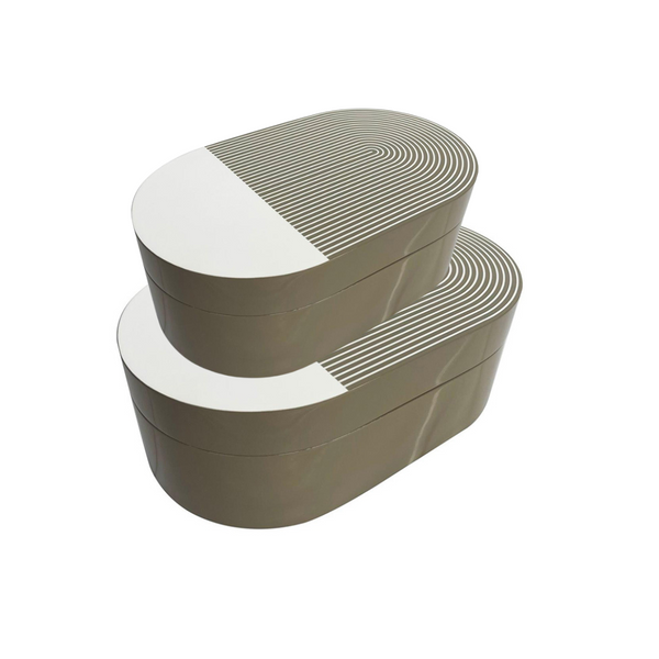 Two stacked Lacquer Stripe Box Grey by Von Gern Home feature oval shapes, beige sides, and white lids with curved gray stripes. Ideal for jewelry storage or as modern decor accents, displayed on a clean white background.