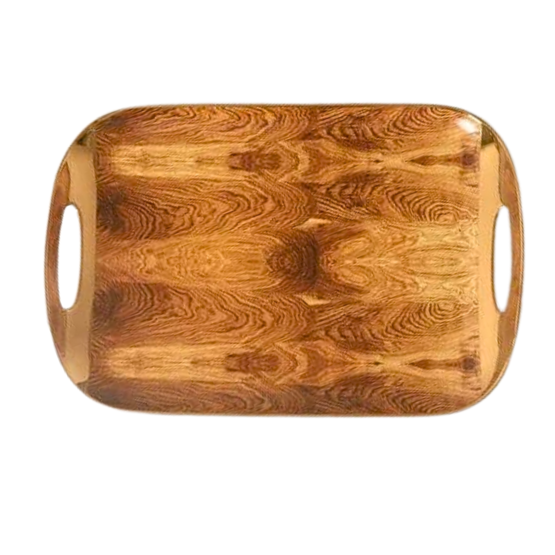 The Madera Gold Handle Tray by PAMPA BAY features a polished surface with rich, wavy wood grain, rounded edges, and two gold oval handles—a perfect mix of rustic charm and practical elegance for any setting.