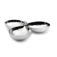The Galaxy 3 Bowl Server by Mary Jurek features three round, hammered stainless steel bowls joined by a central metal loop, highlighting its modern design against a white background.