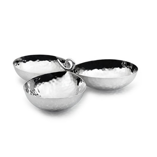 The Galaxy 3 Bowl Server by Mary Jurek features three round, hammered stainless steel bowls joined by a central metal loop, highlighting its modern design against a white background.