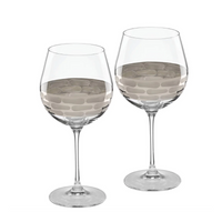 The Truro Red Wine Platinum Set of 2 by Michael Wainwright features two empty wine glasses with long stems and decorative oval-shaped frosted platinum bands on the bowls, displayed against a plain white background.