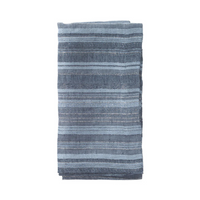 The Bodrum Midas Napkin Set of 4 features folded blue striped fabric with alternating light and dark blue horizontal stripes, displayed on a white background.
