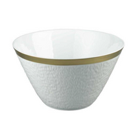 The Raynaud Mineral Irise Gold Filet Dinnerware features a white ceramic bowl with a subtle textured exterior and gold-rimmed edge—an elegant addition to any contemporary table setting.