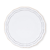 The Molecot Coral Dinnerware Black plate features scalloped porcelain, a slim gold rim, and two wavy dark lines along the border—an elegant design reminiscent of hand-painted dinnerware, shown on a plain white background.