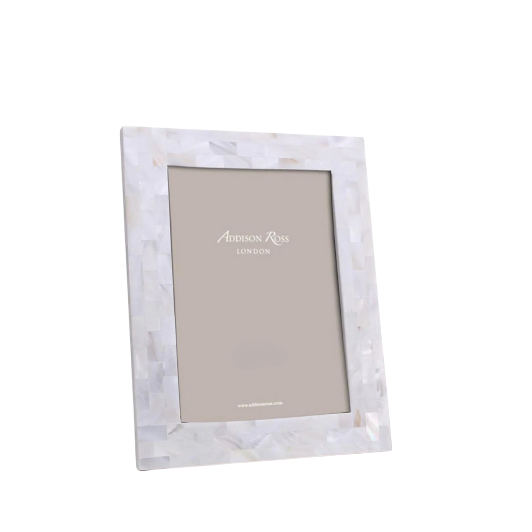 The Addison Ross Mother Of Pearl White Frame is a rectangular, elegant photo frame featuring a white mother-of-pearl mosaic design and comes with a placeholder insert.