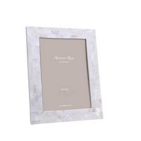 A white, rectangular Addison Ross Mother Of Pearl White Frame with a pearlescent mosaic pattern is shown at an angle on a plain white background. The empty elegant frame displays the Addison Ross brand label inside.