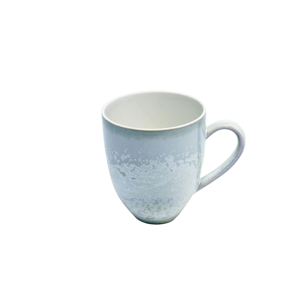 The Song Ocean Dinnerware mug by Jaune De Chrome features a white ceramic finish with a subtle textured pattern and curved handle, capturing the timeless elegance of French design against a plain white backdrop.