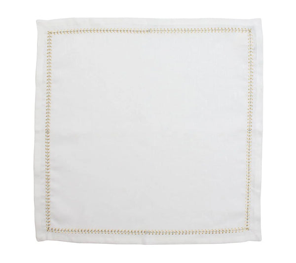 A Kim Seybert Herringbone Napkin Gold & Silver Set of 4 is displayed laid flat on a plain background, featuring a decorative gold embroidered border.
