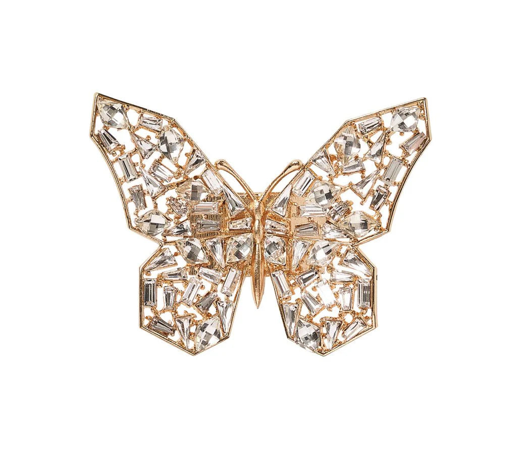 The Kim Seybert Papillon Butterfly Napkin Ring Boxed Set of 4 features gold, openwork butterfly designs adorned with sparkling crystals in geometric patterns—ideal as luxury table decor or elegant napkin rings. Displayed on a plain white background.