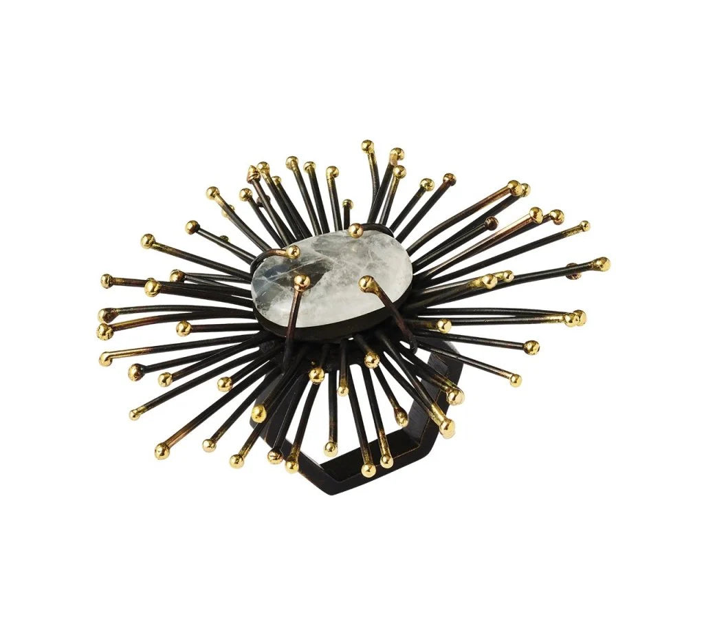 The Kim Seybert Flare Napkin Ring Black & Gold Set of 4 features a handmade starburst design with a central translucent stone, radiating black metal spokes, and gold sphere accents.