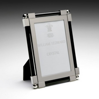 The William Yeoward New Classic Black Frame features sleek black sides, silver nickel corners, and stands upright with a placeholder labeled WILLIAM YEOWARD CRYSTAL.
