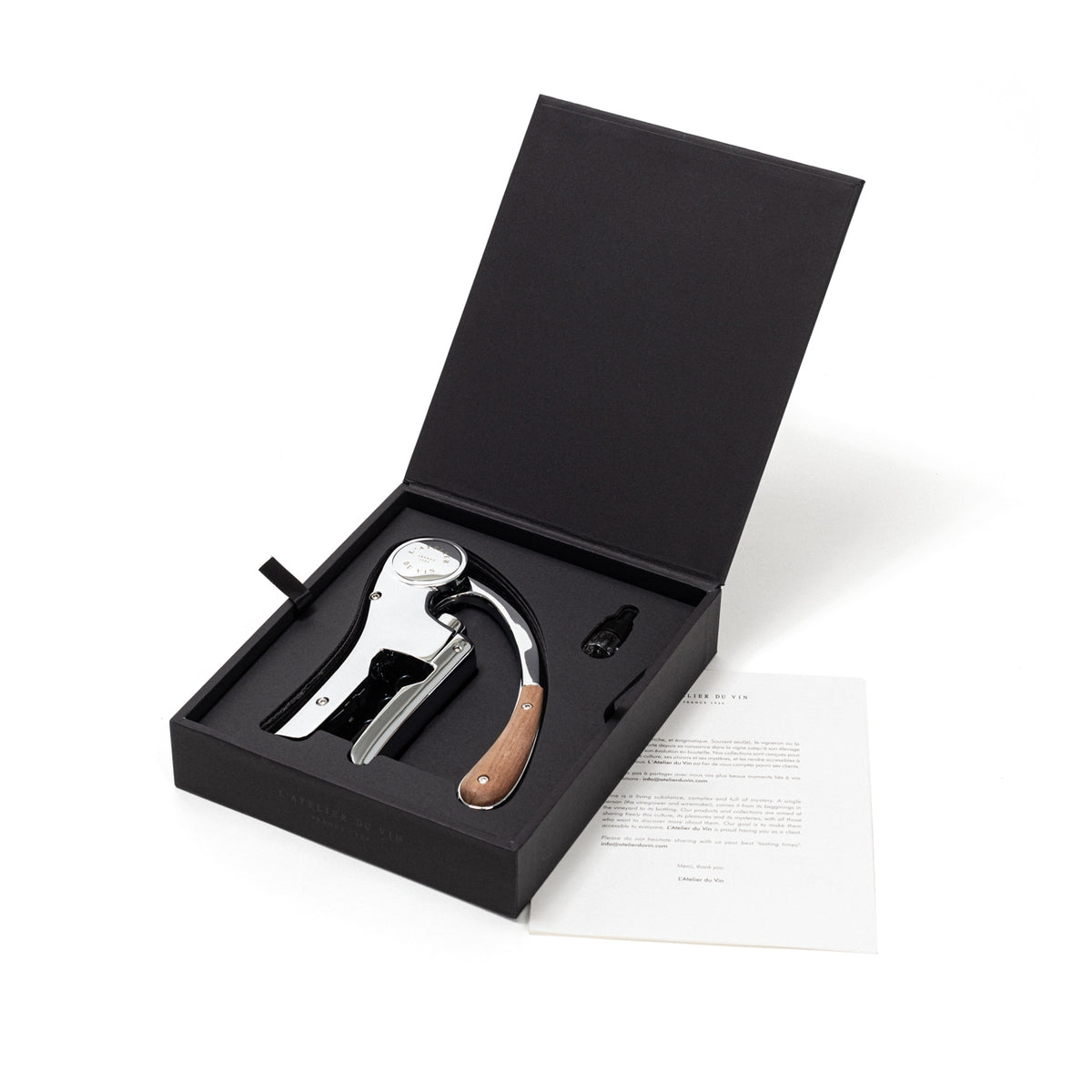 L’ Atelier du Vin Lever Wine Opener - Silver displayed with a wood handle inside an open black luxury gift box, accompanied by a small accessory and a printed note.