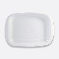A rectangular white ceramic plate from Bernardaud’s Origine Dinnerware collection is photographed from above on a light gray background.