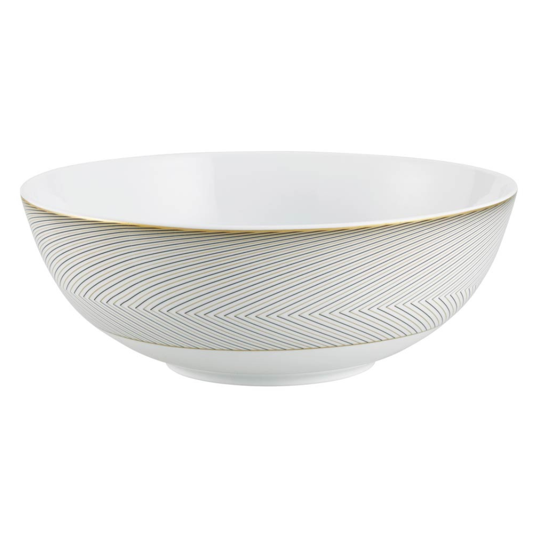 The Oskar Dinnerware bowl by Raynaud is crafted from white Limoges porcelain and showcases a subtle gold and gray chevron design on the exterior, finished with a thin gold rim at the top.