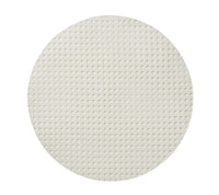 The Kim Seybert Reed Placemats Set of 4 in white features round, flat wafers with a grid-style woven cane pattern, photographed on a plain white background.