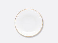 The Bernardaud Palmyre Dinnerware features a plain white plate with a thin gold rim, centered on a light gray background—a perfect choice for a refined table with its understated appearance.