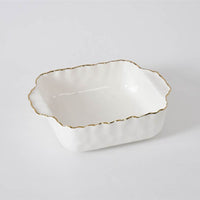 The PAMPA BAY Portofino Square Baker is a white porcelain baking dish with scalloped edges and a thin gold trim, shown on a plain white background.