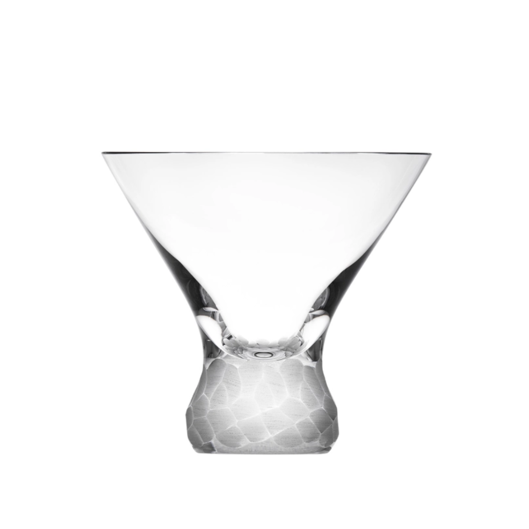 The Moser Pebbles Cocktail Glass 250ml, crafted in crystal with angular sides and a textured faceted base, is shown on a plain white background—ideal for those who appreciate handcrafted drinkware.
