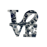 The Eye Candy College Love Sculpture features “LOVE” in bold letters, decorated with blue and white Penn State logos, paw prints, and “We Are Penn State”—a perfect graduation gift for any Nittany Lions fan.