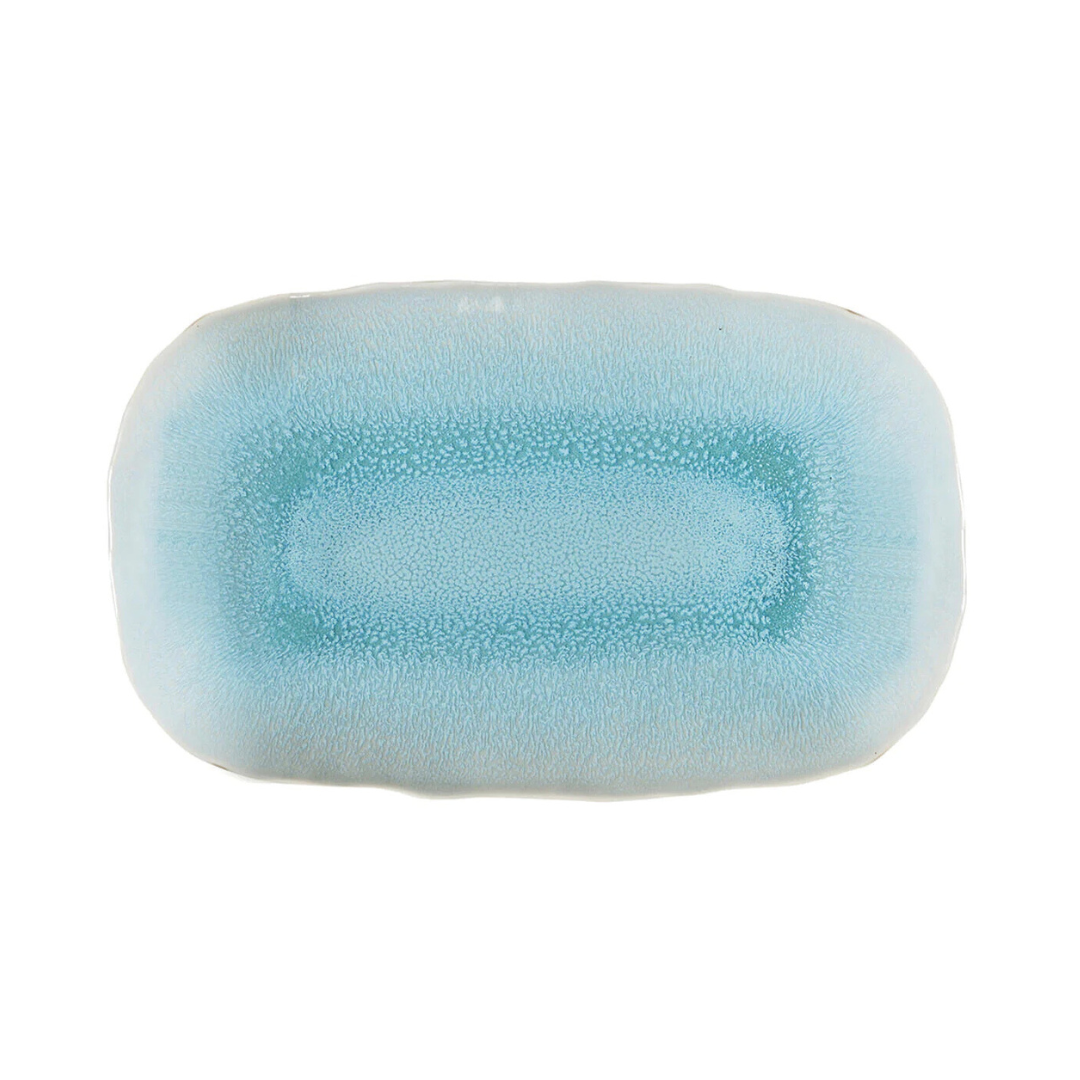 The Plume Ocean Blue by Jars - Rosenthal is a rectangular ceramic plate with rounded edges, featuring a light blue to off-white gradient, a subtle speckled texture, artisanal craftsmanship, and is microwave safe.