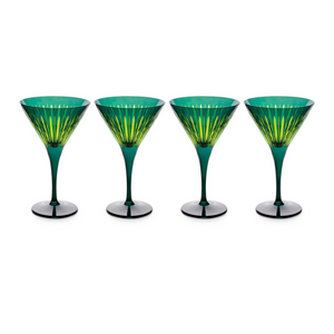 The Prism Martini Set of 4 by L'Objet features four green hand-cut glasses with flared rims, long stems, and a radiant yellow-green pattern inside each bowl, all displayed side by side on a white background.