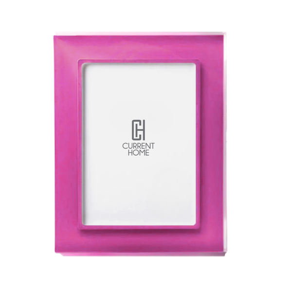 The Prisma Frame - Fuchsia by Bella Moulding is a rectangular pink picture frame with a glossy finish, UV-filtering glass, and a placeholder insert showing the Current Home logo in gray on white.