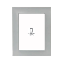 The Bella Moulding Prisma Frame Smoke is a modern acrylic picture frame with a smooth, light gray border and UV-filtering glass to protect your artwork. It features a white placeholder with the Current Home logo in the center.