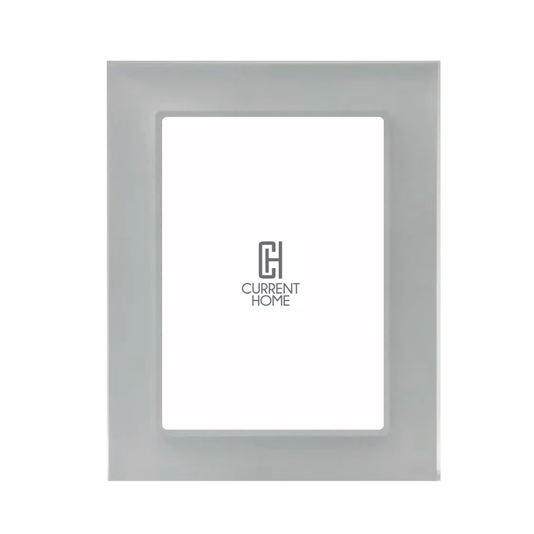 The Prisma Frame Smoke by Bella Moulding is a modern rectangular acrylic picture frame with a wide, light gray border and an empty center displaying the Current Home logo.