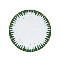 The Molecot Punk Dinnerware Green plate is crafted from white Limoges porcelain, featuring a gold rim and a green geometric sawtooth pattern along the edge.