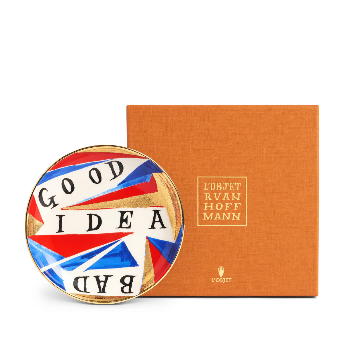 The Good/ - Bad Idea Plate by Ruan Hoffmann for L’Objet features bold lettering and red, blue, and gold geometric accents. This colorful porcelain piece comes in a signature orange L’Objet x Ruan Hoffmann box.