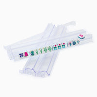 The Oh My Mahjong Mahjong Rack & Pusher Set - Clear features clear plastic racks, perfect for displaying colorful tiles—essential accessories for any American Mahjong game.