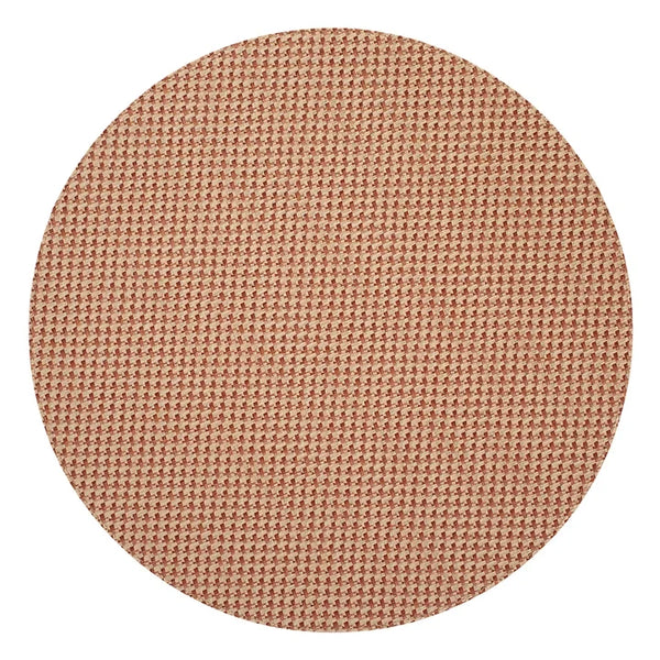 Round Bodrum Rattan Round Placemat - Terracotta with a terracotta-colored vinyl finish and a rattan texture.
