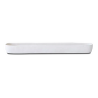 The Tina Frey Resin Trough White Long is a sleek, rectangular tray with rounded corners and raised edges, ideal for serving or table decor, displayed against a plain white background.