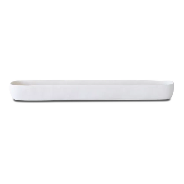 The Tina Frey Resin Trough White Long is a sleek, rectangular tray with rounded corners and raised edges, ideal for serving or table decor, displayed against a plain white background.