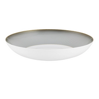 The Oskar Dinnerware shallow white bowl by Raynaud is crafted from Limoges porcelain, featuring a subtle gold and gray geometric grid pattern on the inner surface that fades toward the center. The outer surface remains plain and smooth.