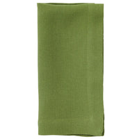 The Bodrum Riviera Napkin Set of 4 features softly textured, plain green linen napkins, neatly folded and displayed against a white background.