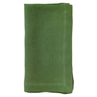 A set of four green Riviera linen napkins by Bodrum is neatly folded and displayed against a plain white background.