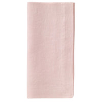 The Bodrum Riviera Napkin Set of 4 is shown neatly folded in light pink, displayed against a white background.