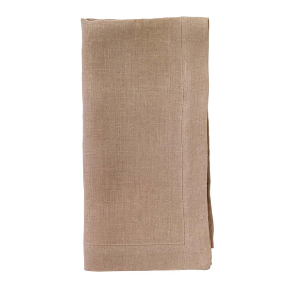 The Bodrum Riviera Napkin Set of 4 features neatly folded light brown stone-washed linen napkins with stitched borders, showcased against a white background.