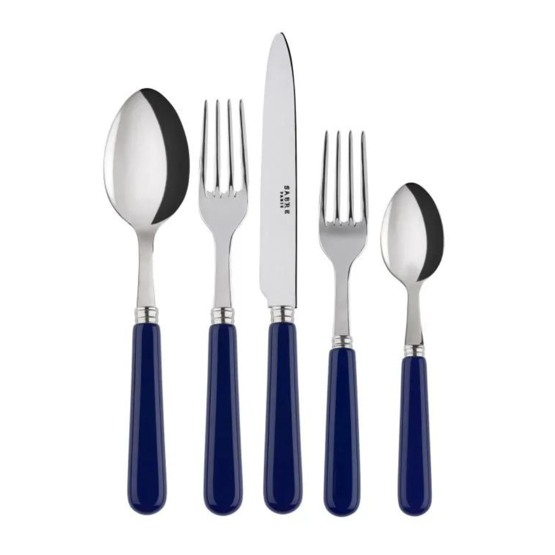 The Sabre Basic Flatware 5 Piece Setting by Sabre features stainless steel utensils with blue acrylic handles—tablespoon, dinner fork, dinner knife, salad fork, and teaspoon—displayed side by side on a white background.